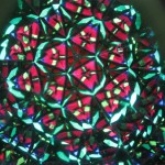 multi-colored view of inside of stained glass kaleidoscope